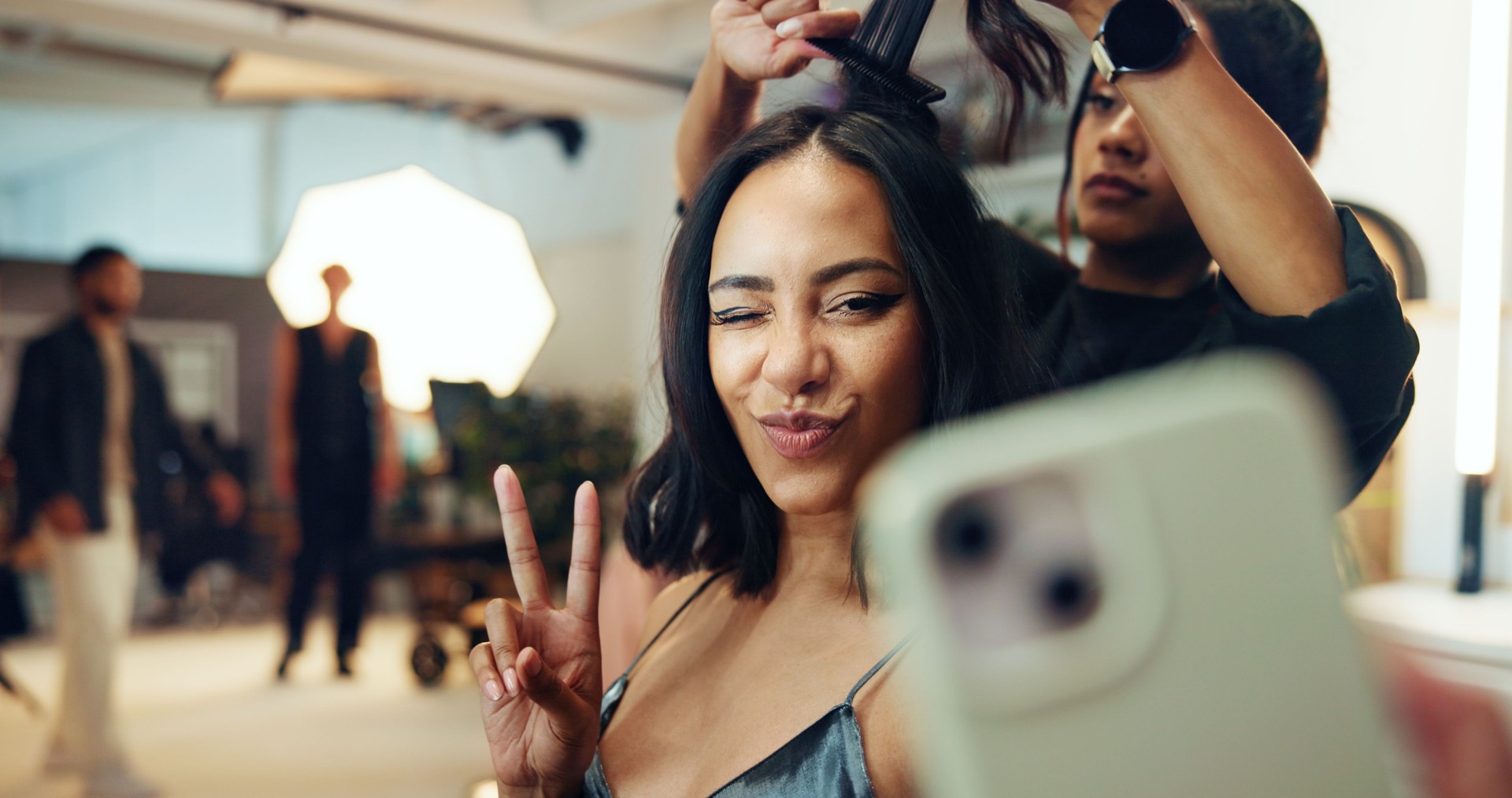 Woman, stylist and selfie with fashion backstage of photography, social media post and magazine. People, beautician and influencer photoshoot for interview, filming production and bts set of industry